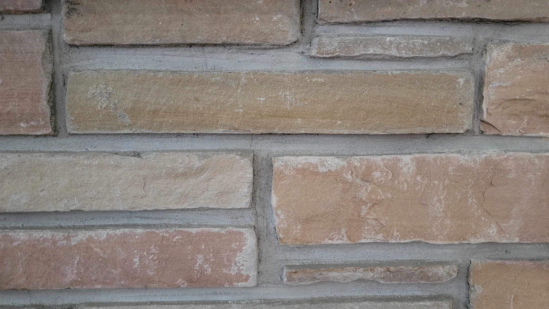 Bricks and mortar of a fireplace mantel.